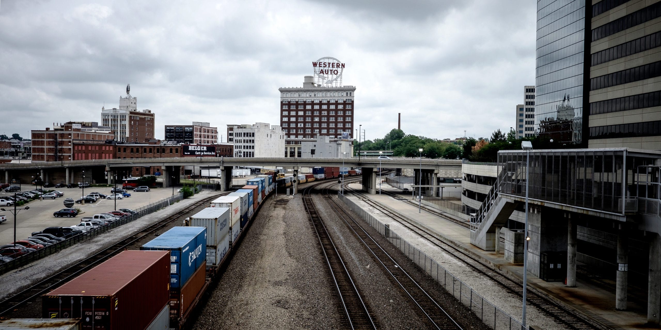A Kansas City train yard with the Western Auto sign in the distance. Photo by Flickr user Luca Sartoni.